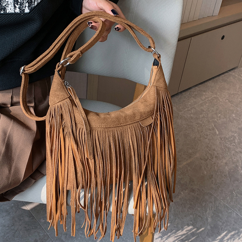 New American Bohemian fringe women's bag imitation deerskin vintage saddle bag Fashion Spice crossbody bag 2025