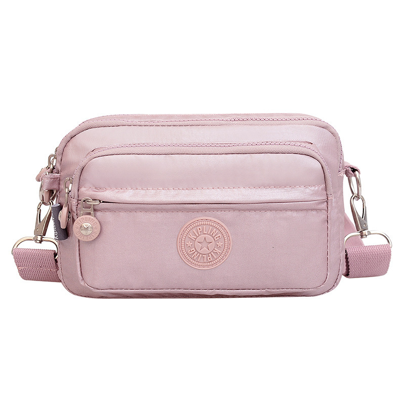 2025S Fashion Designer Ladies With Waist Buckle Nylon Anti Splash Fashion Shoulder Crossbody Solid Color Work Travel Bag