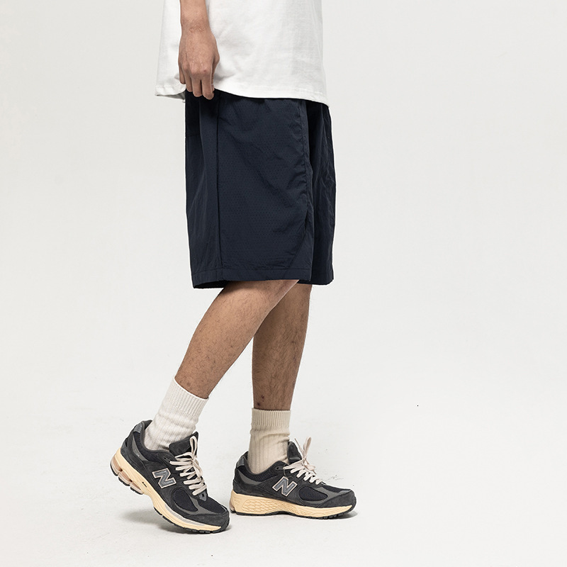 2025S Fashion Designer ATBORDER Summer New Trendy Brand Multi Pocket Panel Waterproof Beach Shorts For Men S Breathable Loose Capris