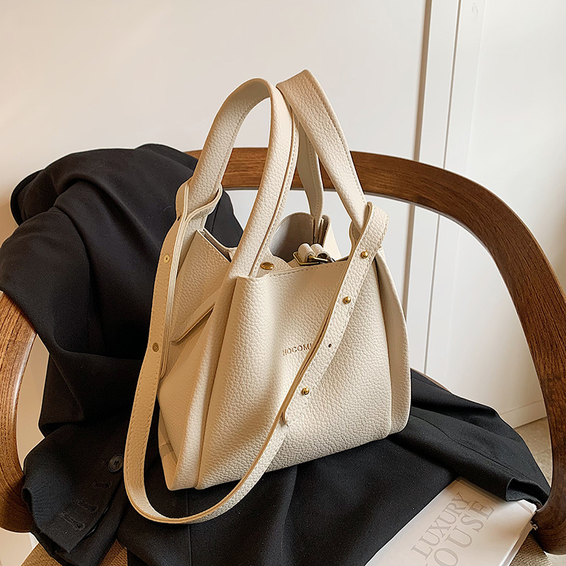 Women's fashion hand-held bucket bag summer style simple and leisure single shoulder bag Korean version niche trendy crossbody bag