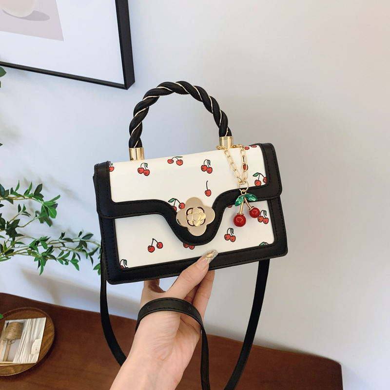New lovely cherry print crossbody bag twist hand bag small square fresh color contrast design girl bag 2025