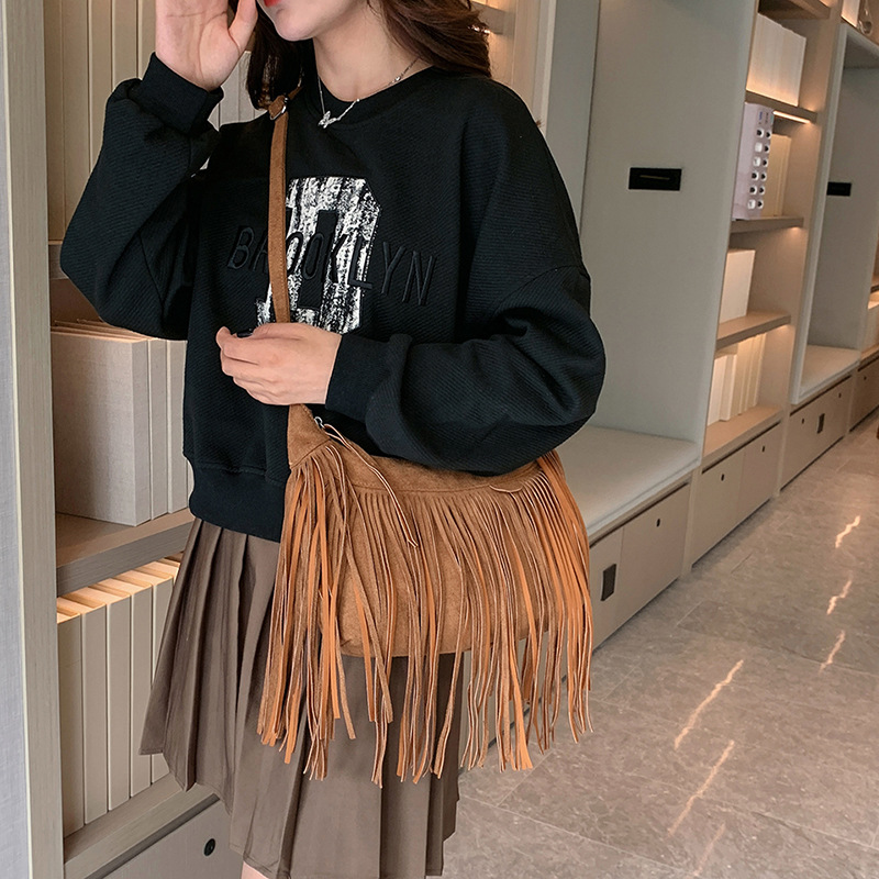 New American Bohemian fringe women's bag imitation deerskin vintage saddle bag Fashion Spice crossbody bag 2025