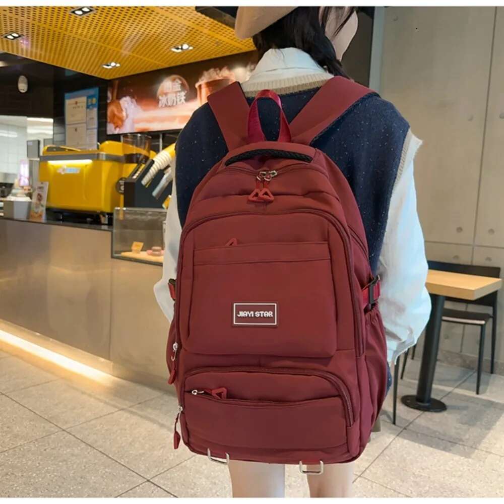 2025S Fashion Designer For Girls Large Capacity Nylon Waterproof College And High School Schoolbag Literary Women Backpack
