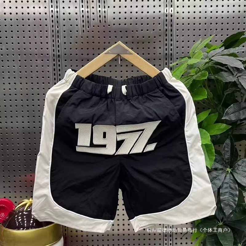 2025S Fashion Designer Summer New Trendy Brand Fashionable Casual Shorts Men S Patchwork Five Quarter Embroidered Loose Outdoor Sports Beach Pants