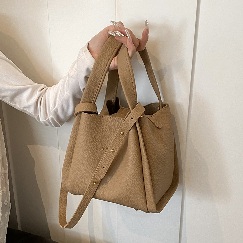 Women's fashion hand-held bucket bag summer style simple and leisure single shoulder bag Korean version niche trendy crossbody bag