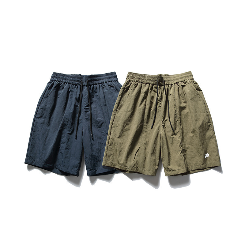 2025S Fashion Designer ATBORDER Summer New Trendy Brand Multi Pocket Panel Waterproof Beach Shorts For Men S Breathable Loose Capris