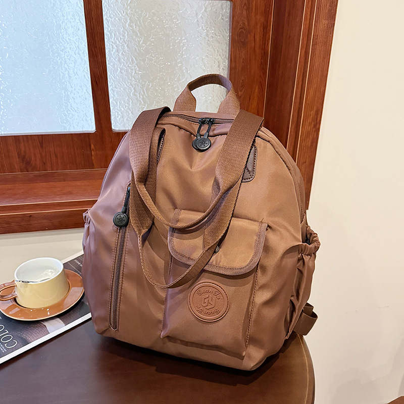 Large capacity shell bag lightweight new shoulder bag short business trip backpack Fashion trend commuter bag women