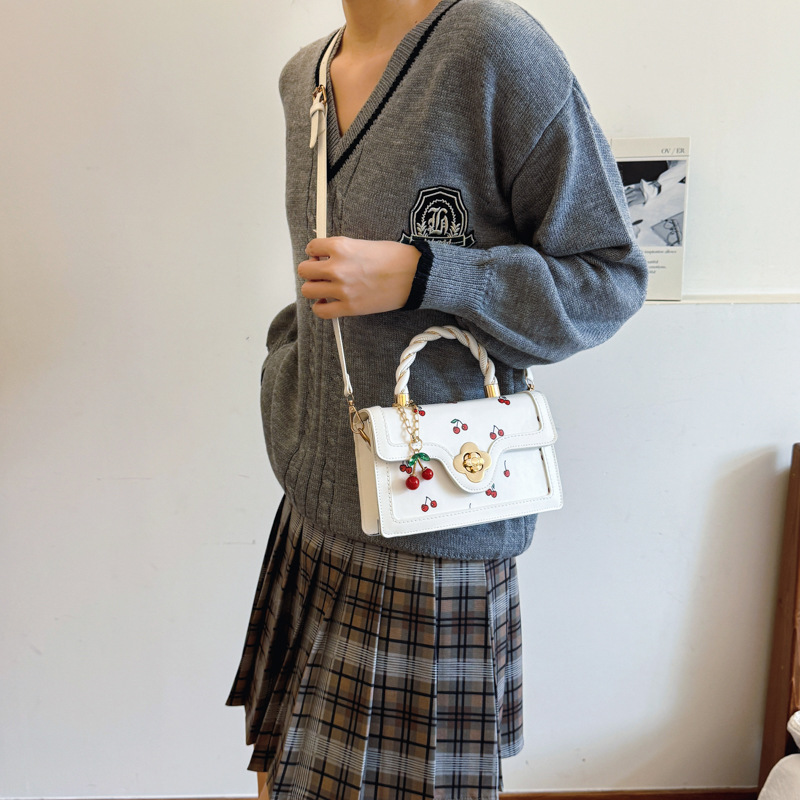 New lovely cherry print crossbody bag twist hand bag small square fresh color contrast design girl bag 2025