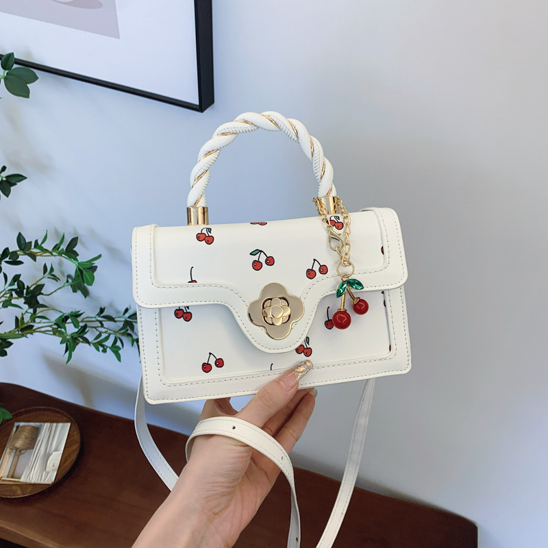 New lovely cherry print crossbody bag twist hand bag small square fresh color contrast design girl bag 2025