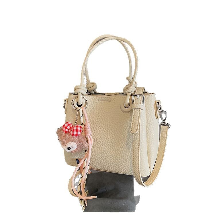 2025S Fashion Designer Litchi Patterned Vegetable Basket Crossbody New Hand Held Bucket Women S Bag High End And Versatile Commuting Shoulder Bag