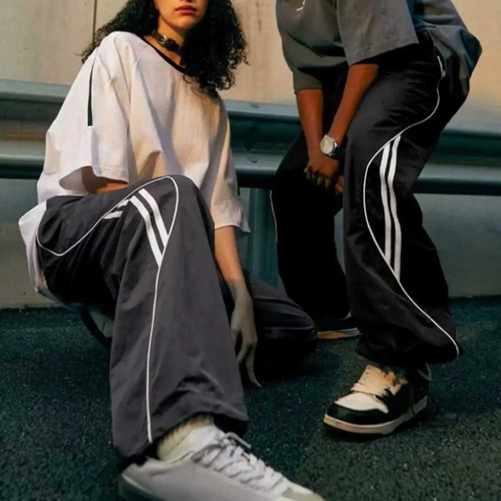 Urban style sports Trouser retro American unisex pants with side pockets elastic waist and wide legs used for gym trainingT250322