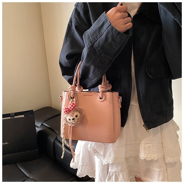 2025S Fashion Designer Litchi Patterned Vegetable Basket Crossbody New Hand Held Bucket Women S Bag High End And Versatile Commuting Shoulder Bag