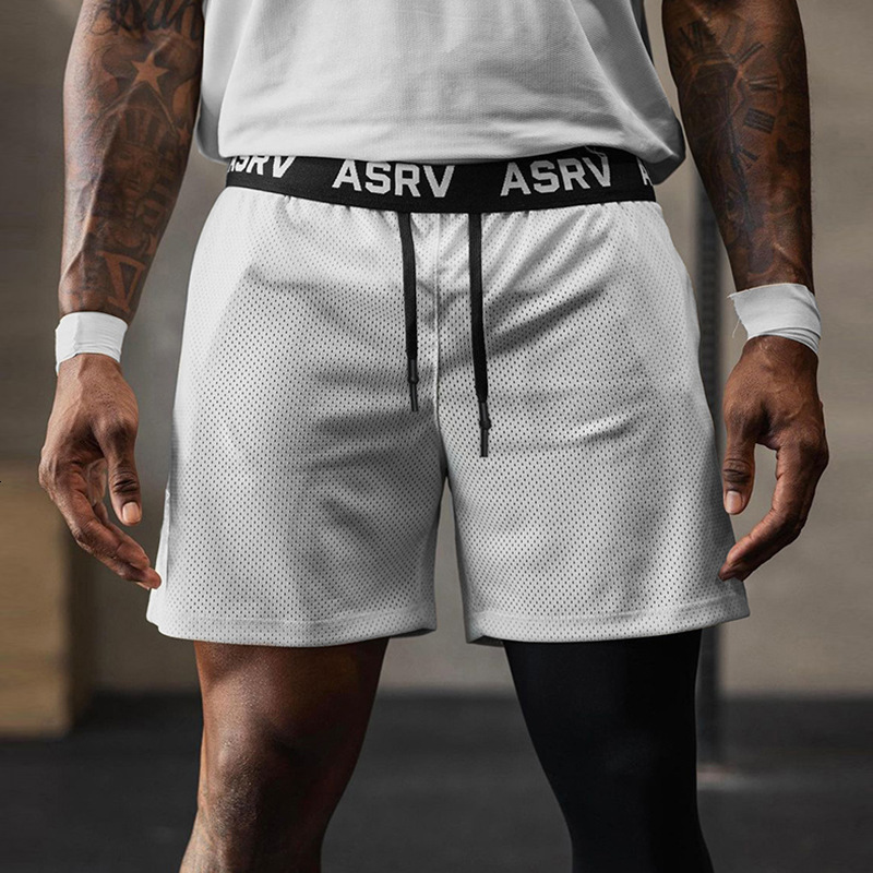 2025S Fashion Designer Summer American Fashion Brand Loose Mesh Quick Drying Five Quarter Pants Men S Multi Pocket Running Sports Shorts