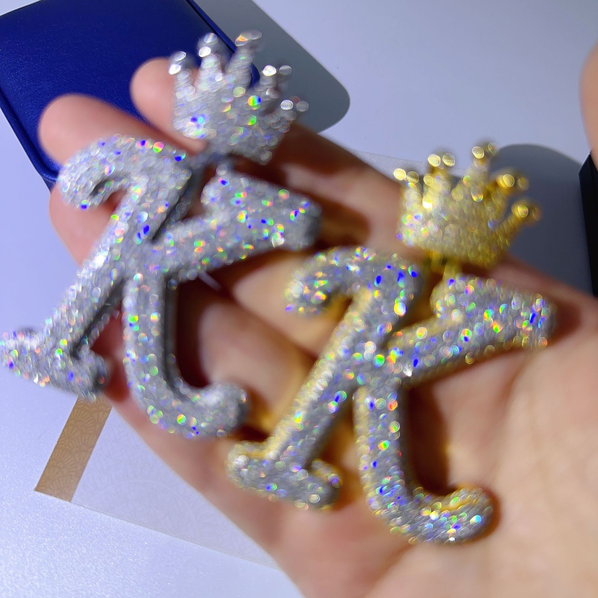 Diamond hair new S925 pure silver inlaid moissanite crown letter pendant INS fashionable and cool hip-hop pendant