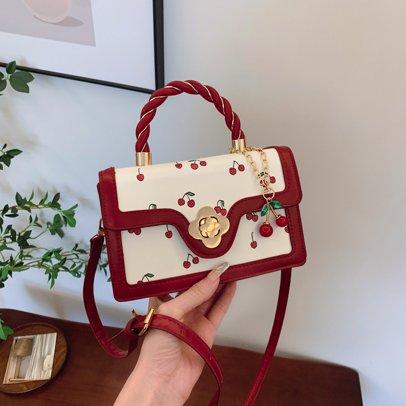 New lovely cherry print crossbody bag twist hand bag small square fresh color contrast design girl bag 2025