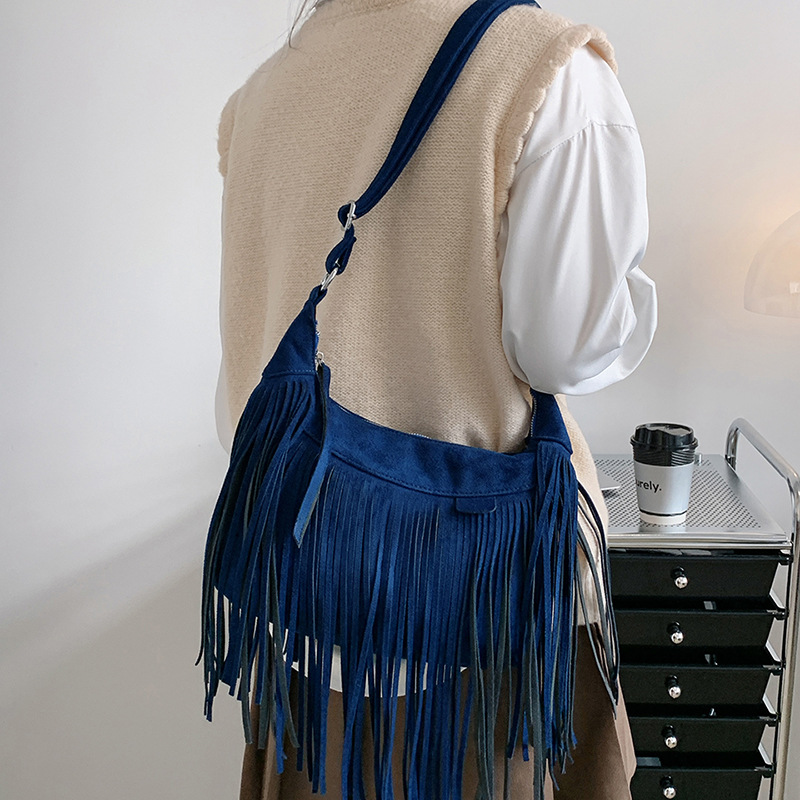 New American Bohemian fringe women's bag imitation deerskin vintage saddle bag Fashion Spice crossbody bag