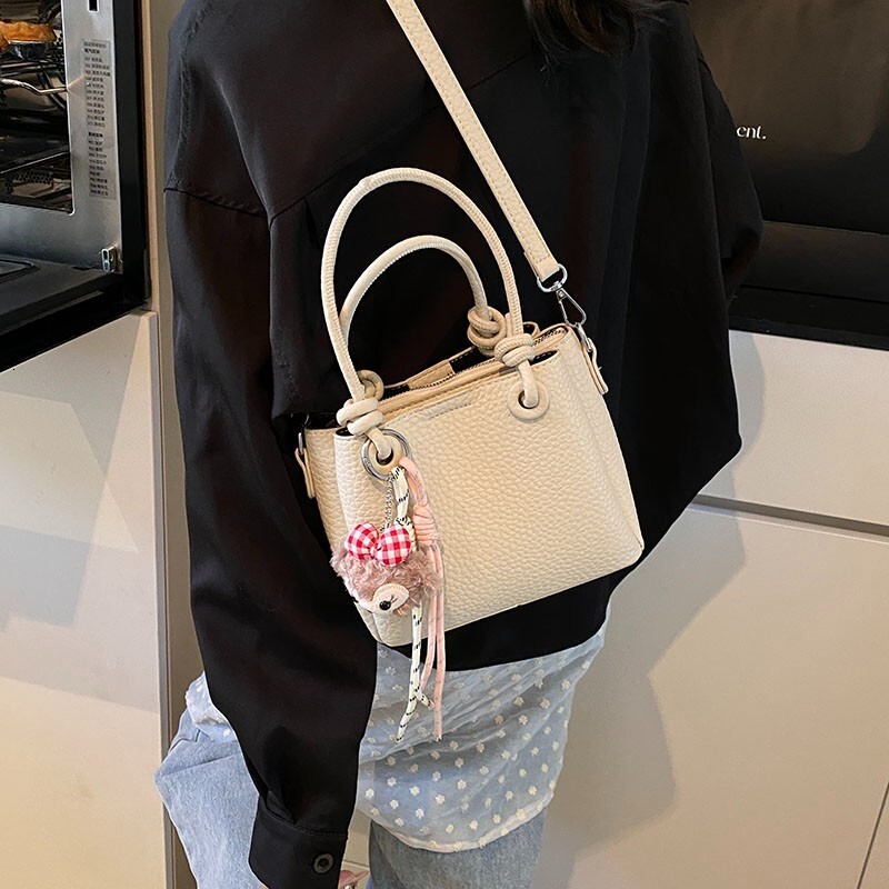 2025S Fashion Designer Litchi Patterned Vegetable Basket Crossbody New Hand Held Bucket Women S Bag High End And Versatile Commuting Shoulder Bag