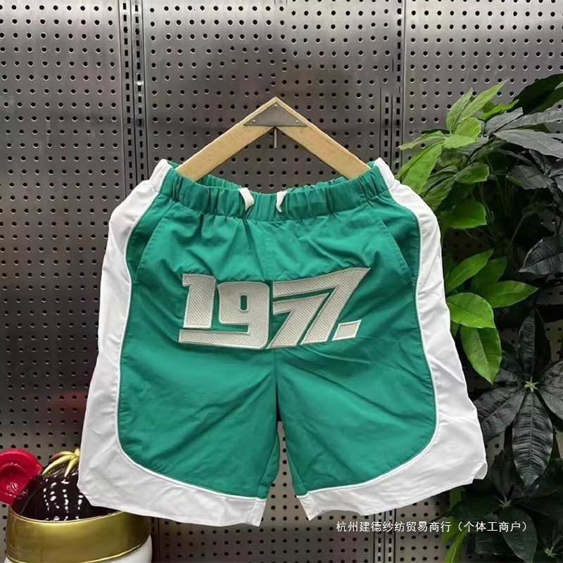 2025S Fashion Designer Summer New Trendy Brand Fashionable Casual Shorts Men S Patchwork Five Quarter Embroidered Loose Outdoor Sports Beach Pants