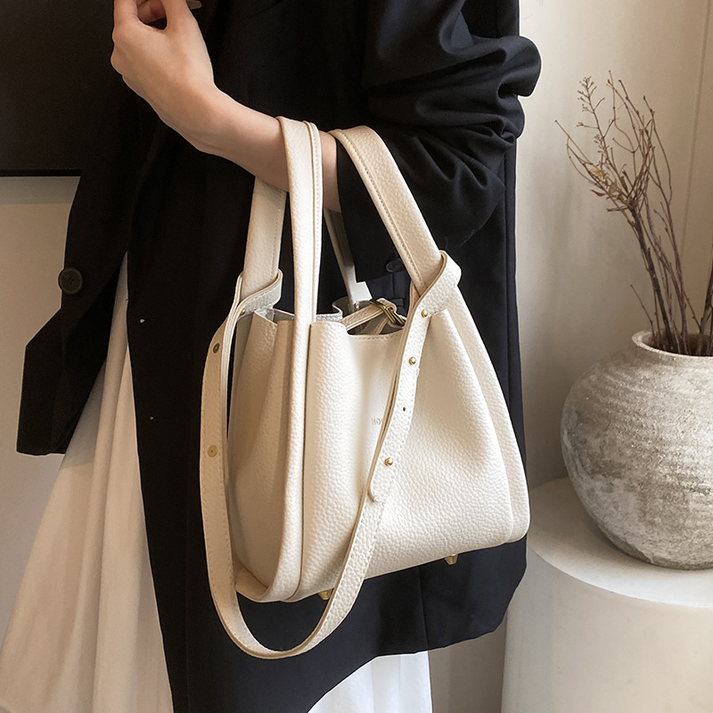 Women's fashion hand-held bucket bag summer style simple and leisure single shoulder bag Korean version niche trendy crossbody bag