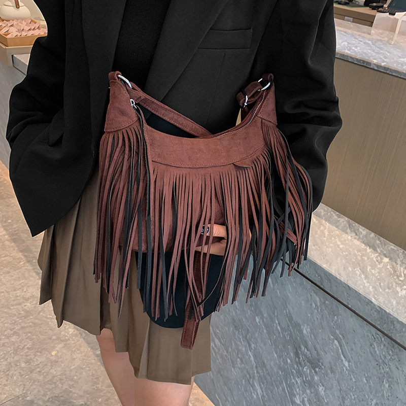 New American Bohemian fringe women's bag imitation deerskin vintage saddle bag Fashion Spice crossbody bag 2025