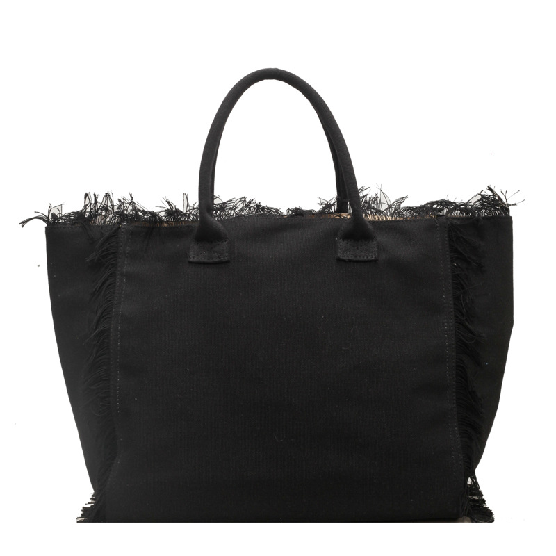 Letter tassel canvas bag large capacity bag women's new solid color commuter shoulder Tote bag