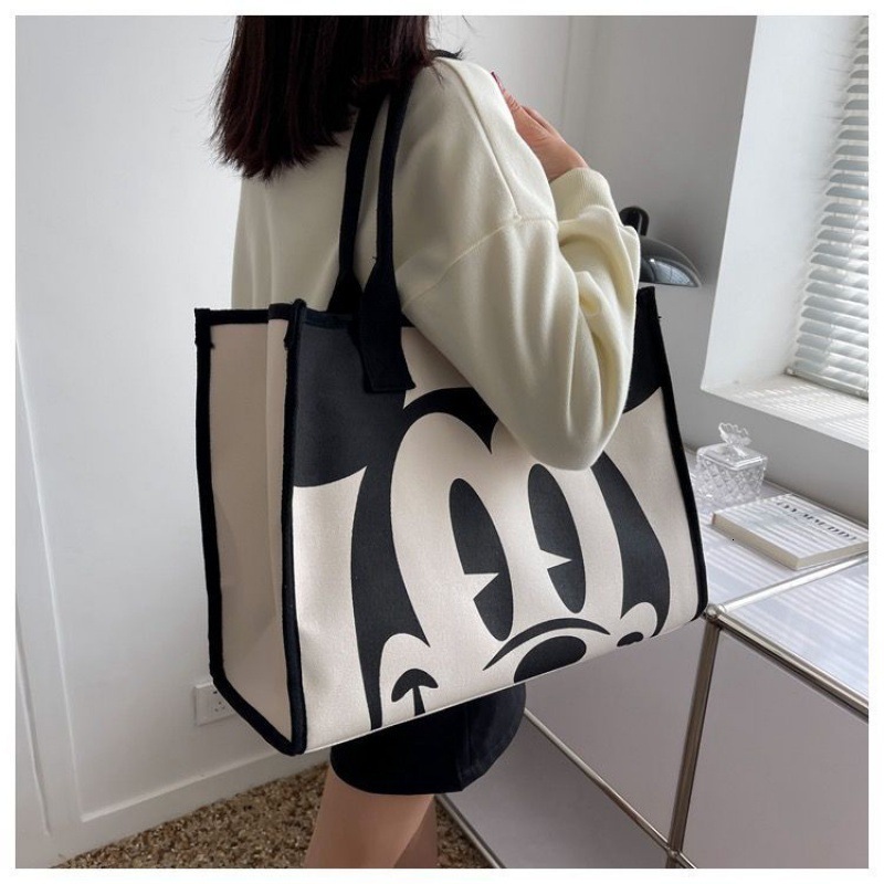 2025S Fashion Designer Cartoon Printed New Canvas Women S Fashion Shoulder Bag Commuting Tote Bag