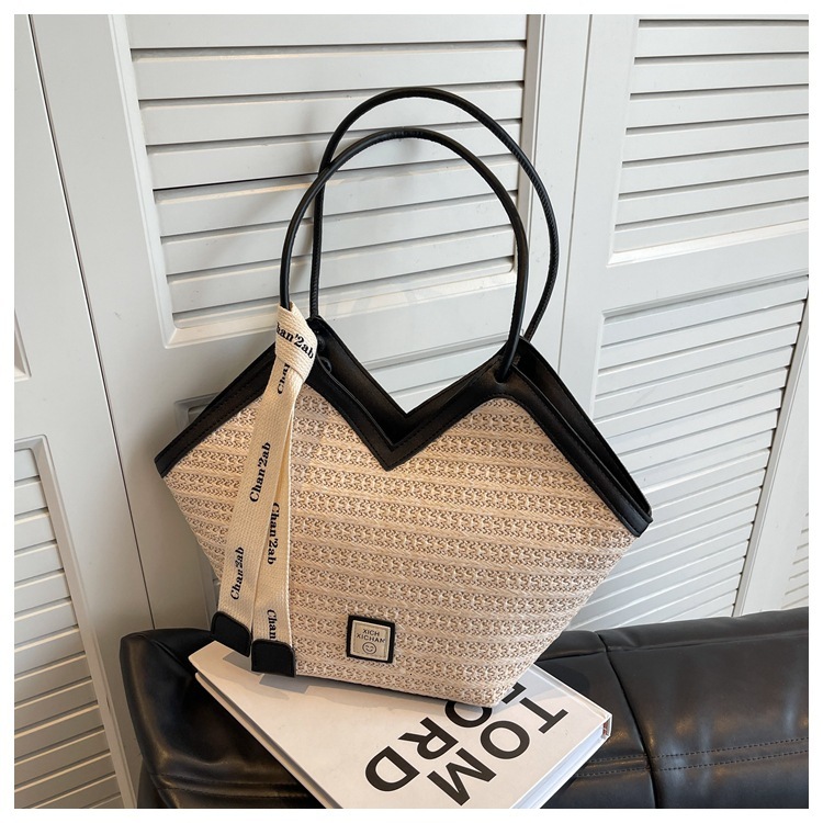 2025S Fashion Designer Large Capacity Grass Woven For Women New Fashionable Versatile Shoulder Commuting Beach Vacation Tote Bag