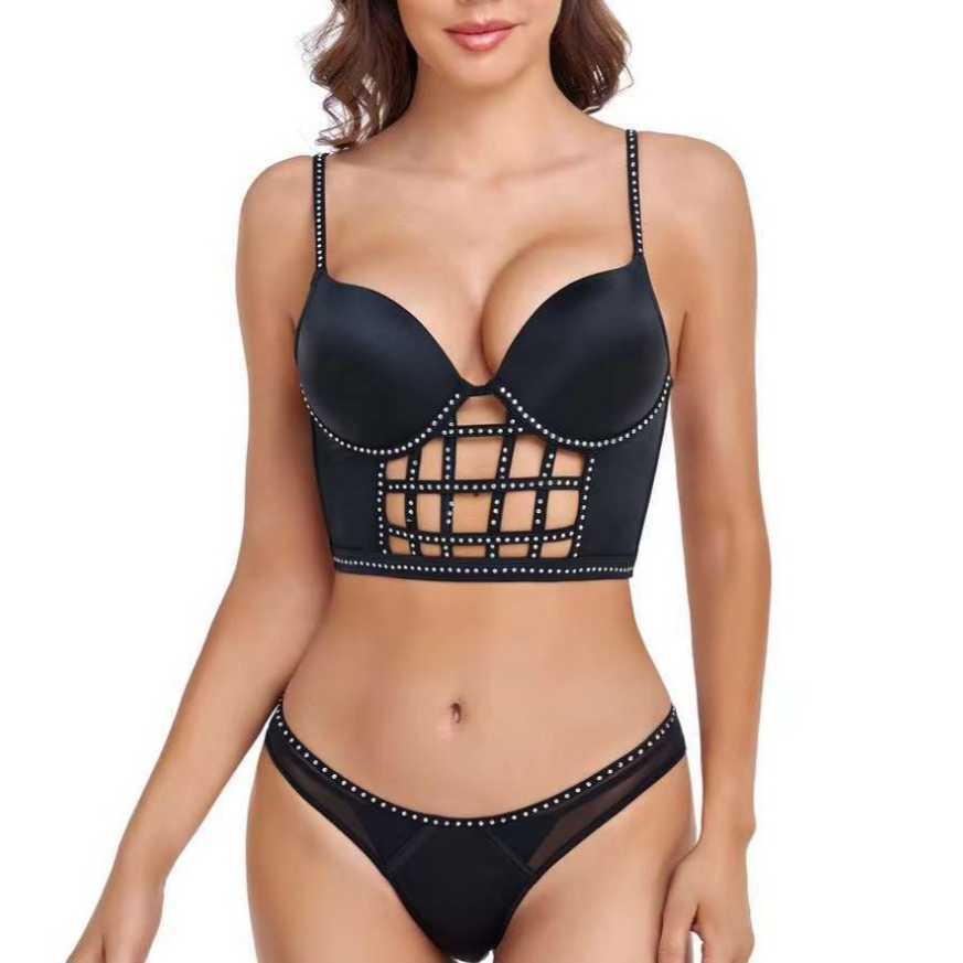 Fashionable and sexy hollowed out fishbone suit with thin top, thick bottom, and top support, gathered together with bra nails and diamond smooth surf