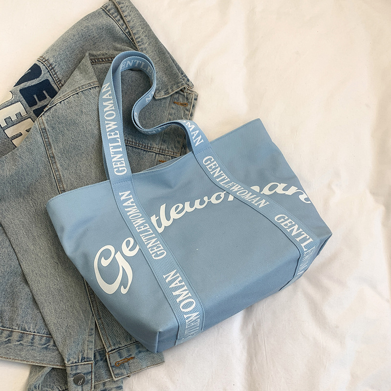 2025S Fashion Designer Gentle Woman Large Capacity Commuter Mommy Tote New Letter Strap Handheld Shoulder Bag