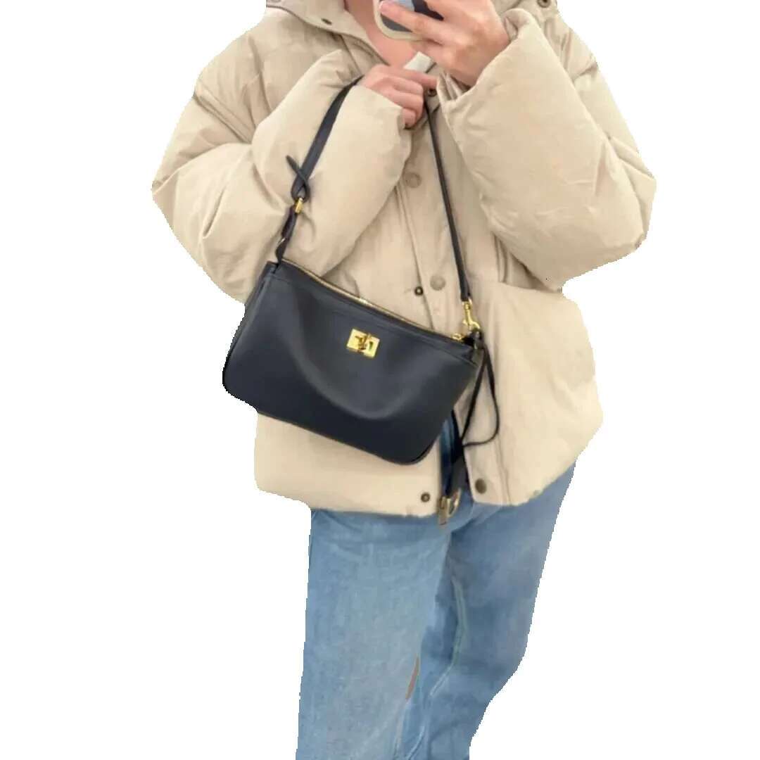 2024 New Cowhide B Home Lock Underarm Premium Leather Handheld Crossbody Women's Bag Simple Commuter The Single Shoulder Bag