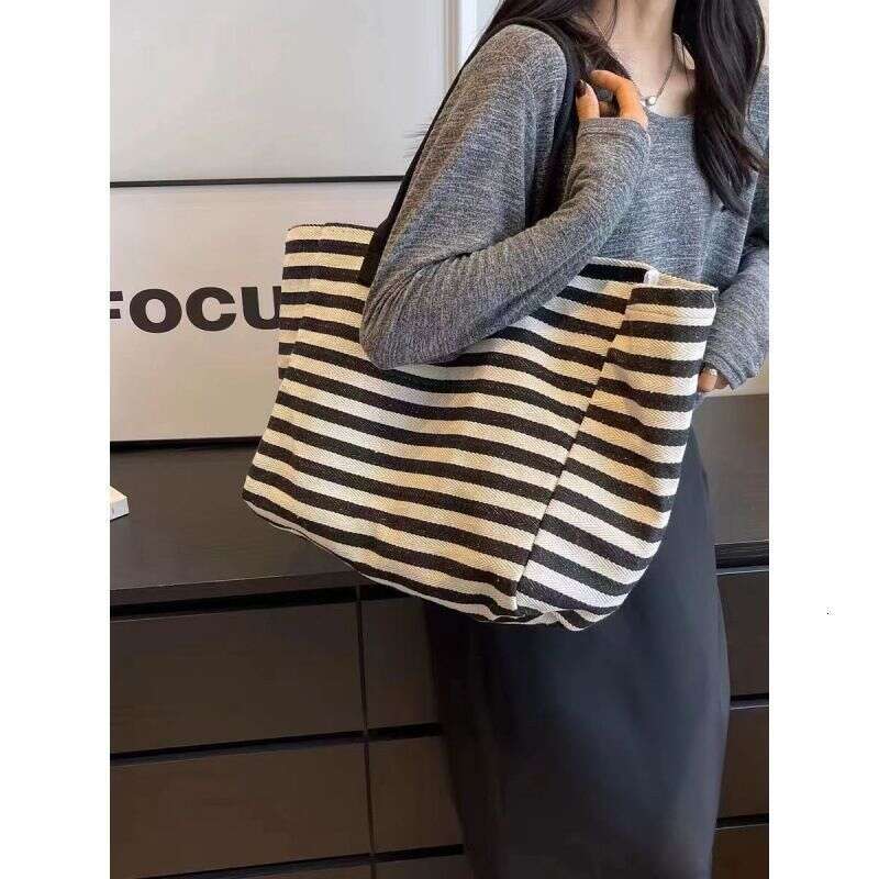 2025S Designer S New Model Commuting Canvas Women S Large Capacity Bag New Striped Single Shoulder Mommy Tote Bag