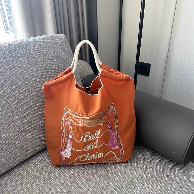 2025S Fashion Designer High Quality Homemade Ball Chain Environmentally Friendly Shopping With Fabric Embroidery And Hand Held Nylon Canvas Bag