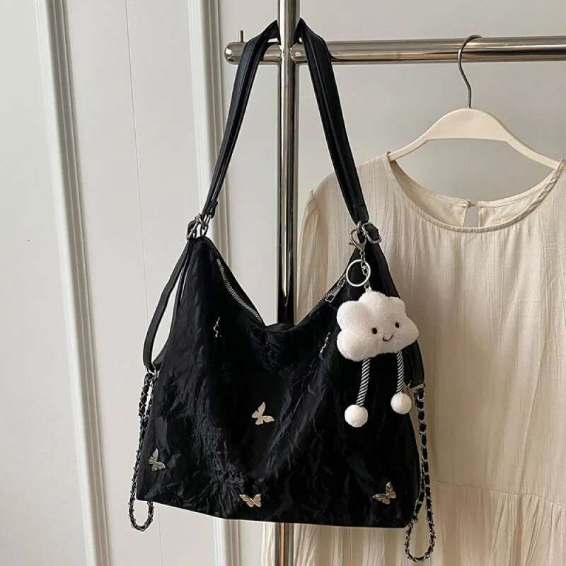 2025 summer new women's high-capacity high-end niche commuting designer fashion handbag, single shoulder crossbody bag1