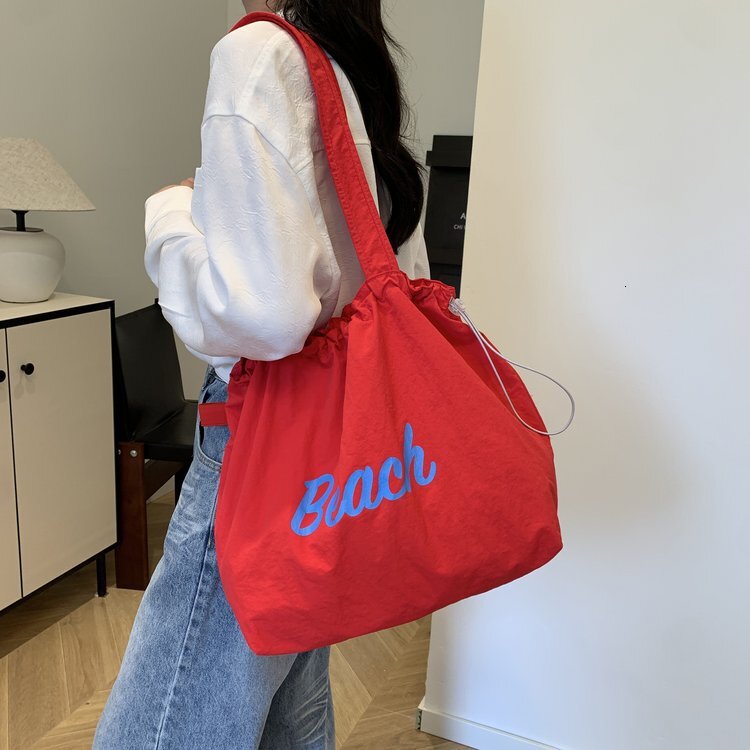 2025S Fashion Designer Summer New Canvas Trendy Shoulder Female High School Student Handbag Texture Underarm Bag