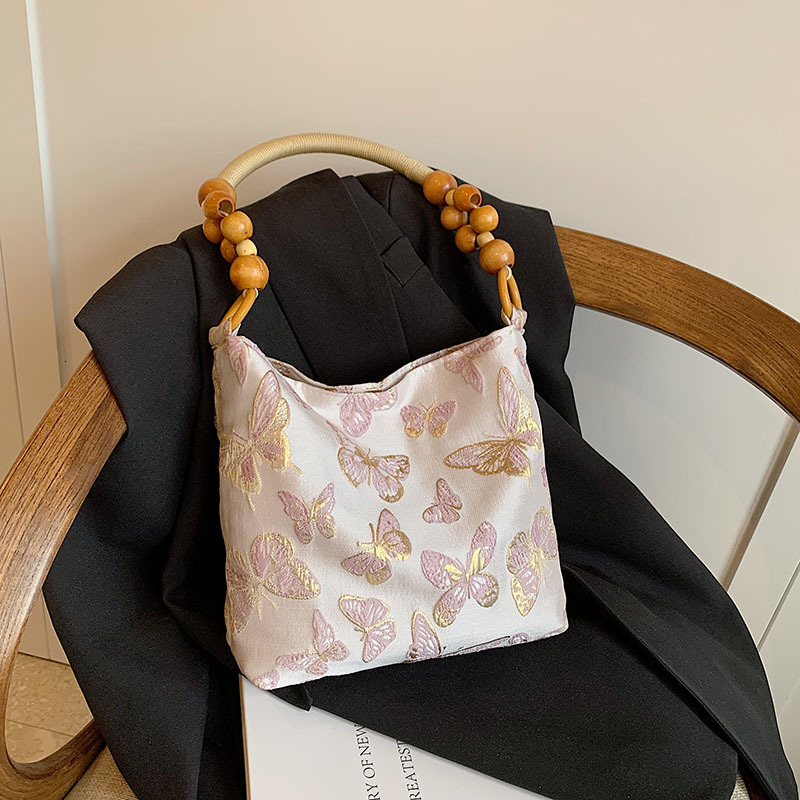2025S Fashion Designer Summer Versatile High End And Niche Underarm For Women In New Chinese Tote Portable Bamboo Joint Bag