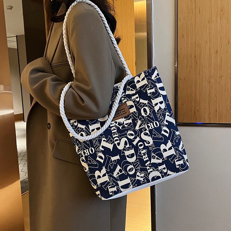2025S Fashion Designer Cheap Handbag Casual Versatile Letter Shoulder Ins Japanese And Korean Minimalist Tote Student Bag Trend