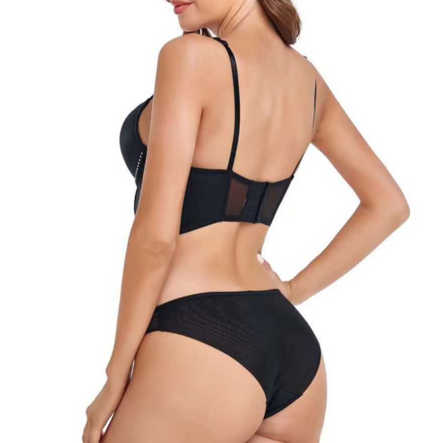 Fashionable and sexy hollowed out fishbone suit with thin top, thick bottom, and top support, gathered together with bra nails and diamond smooth surf