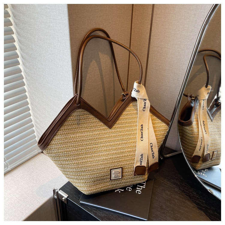 2025S Fashion Designer Large Capacity Grass Woven For Women New Fashionable Versatile Shoulder Commuting Beach Vacation Tote Bag