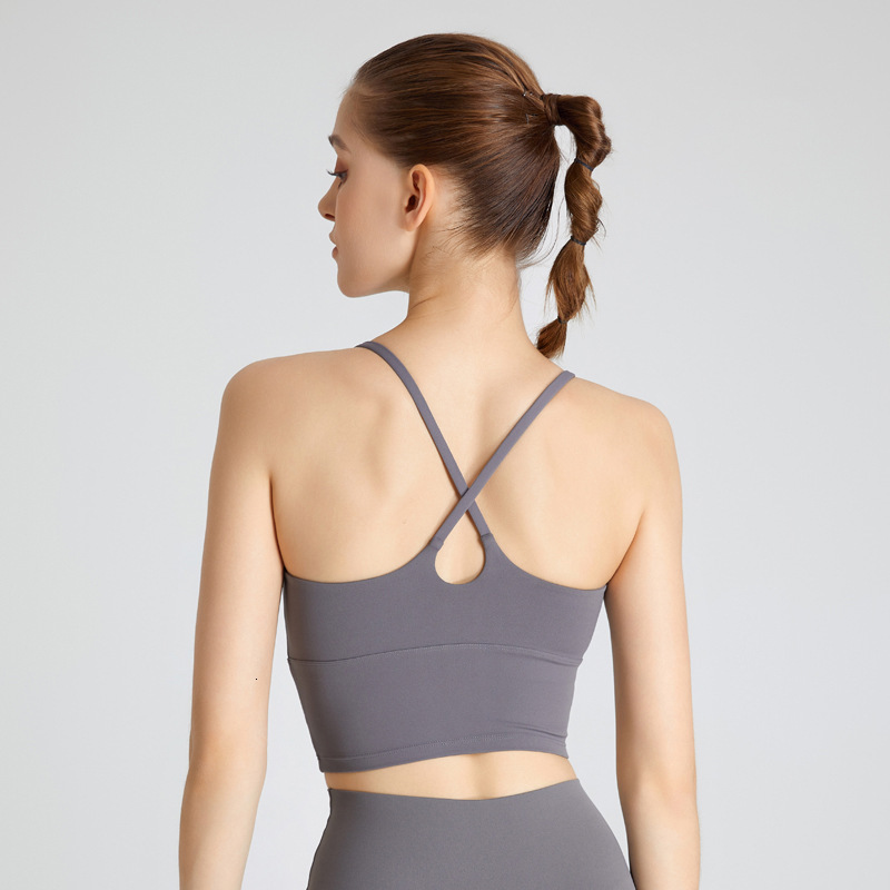 sports underwear with cross shaped water droplets, beautiful back, thin shoulder straps in same color scheme, widened hem after the tracksuit