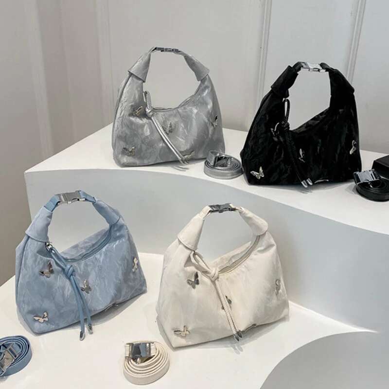 2025 new women's butterfly girl Korean style niche high-end cross body full shoulder designer fashionable women's bag sweet and cool girl st