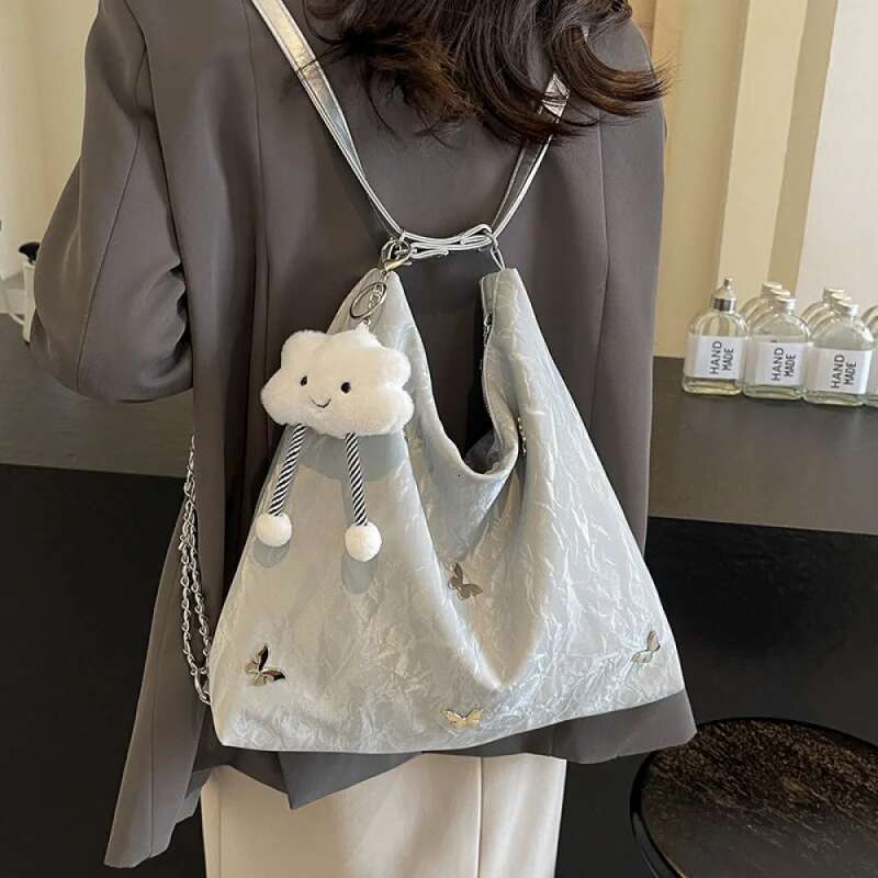 2025 summer new women's high-capacity high-end niche commuting designer fashion handbag, single shoulder crossbody bag1