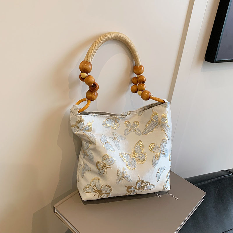 2025S Fashion Designer Summer Versatile High End And Niche Underarm For Women In New Chinese Tote Portable Bamboo Joint Bag