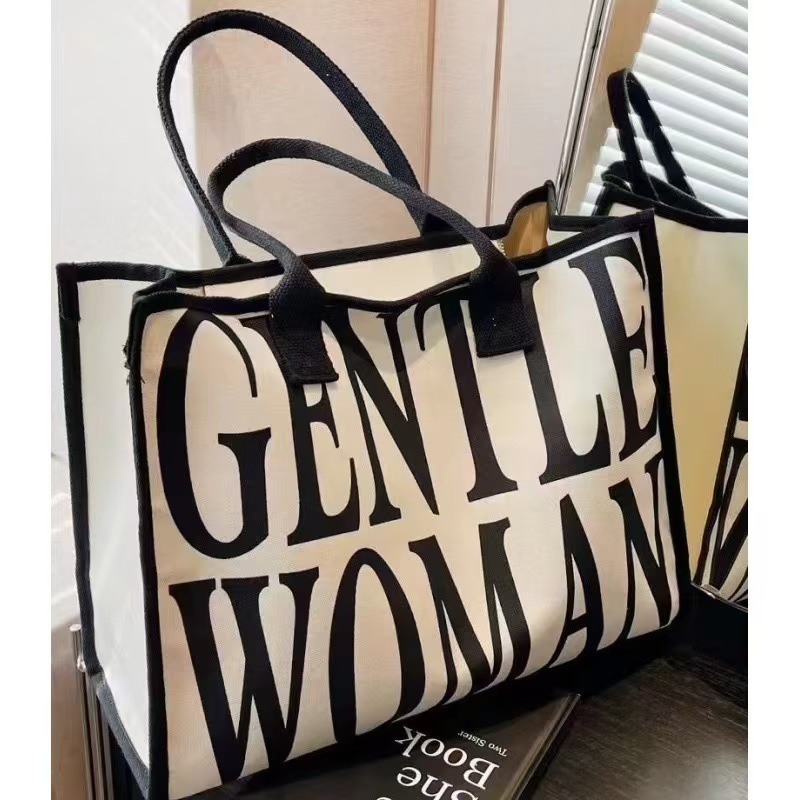 2025S Fashion Designer Cartoon Printed New Canvas Women S Fashion Shoulder Bag Commuting Tote Bag