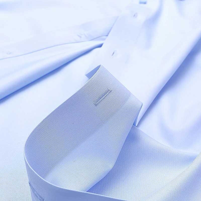 Spring and summer new mens long sleeved ironless moisture-proof pocket sized business suit white shirt mens formal clothing X250324