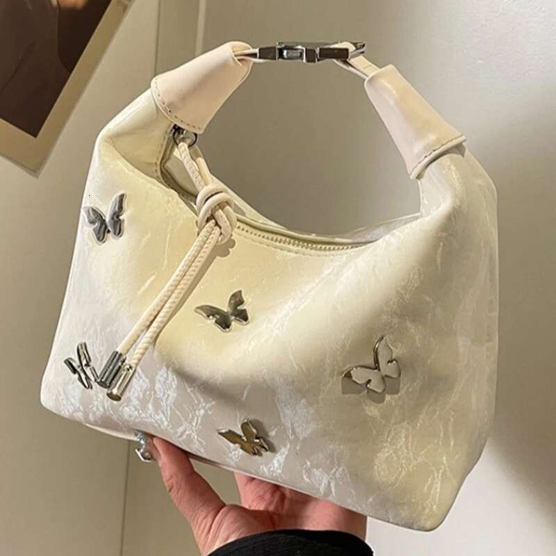 2025 new women's butterfly girl Korean style niche high-end cross body full shoulder designer fashionable women's bag sweet and cool girl st