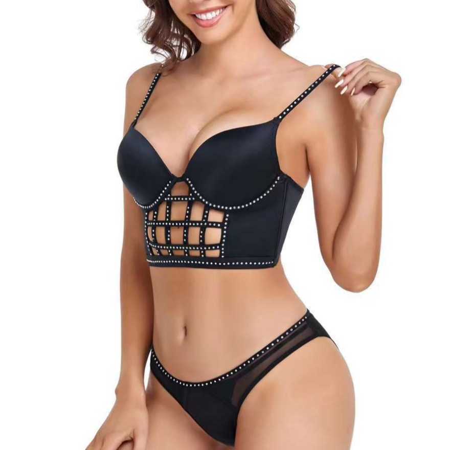 Fashionable and sexy hollowed out fishbone suit with thin top, thick bottom, and top support, gathered together with bra nails and diamond smooth surf