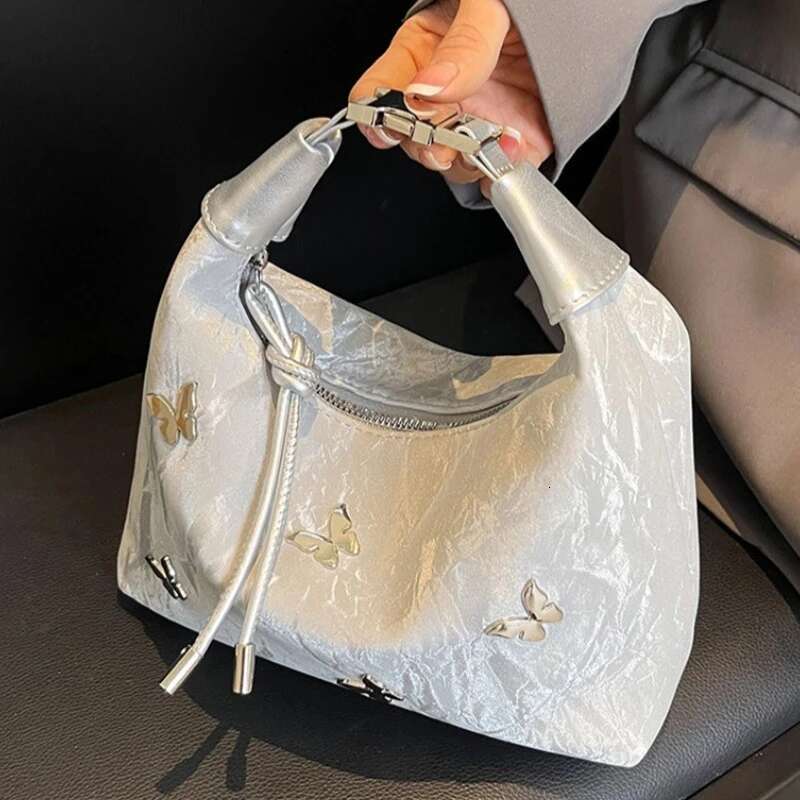2025 new women's butterfly girl Korean style niche high-end cross body full shoulder designer fashionable women's bag sweet and cool girl st