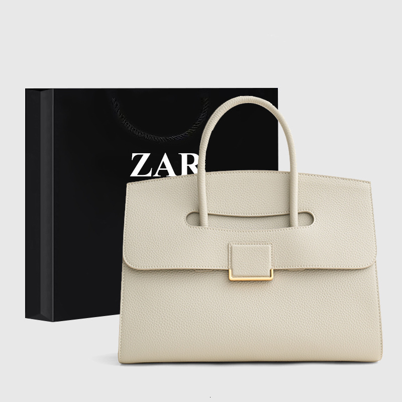 2025S Fashion Designer Guangzhou Women S Bag Large Capacity Commuting Versatile Briefcase Female Niche Design Simple And High End Feel Handbag Trend