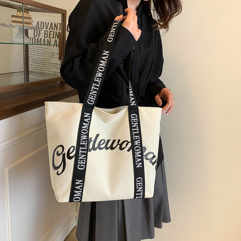 2025S Fashion Designer Gentle Woman Large Capacity Commuter Mommy Tote New Letter Strap Handheld Shoulder Bag
