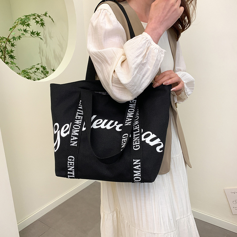 2025S Fashion Designer Gentle Woman Large Capacity Commuter Mommy Tote New Letter Strap Handheld Shoulder Bag